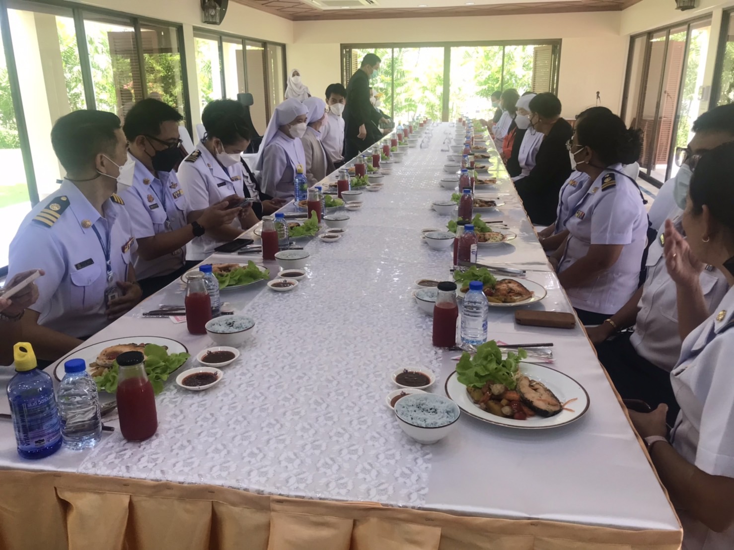 Arranging a Luncheon for the Visitors of WU